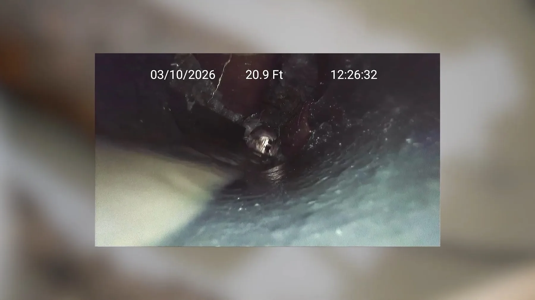 The pipe camera view of cast iron sewer during a service and repair visit.